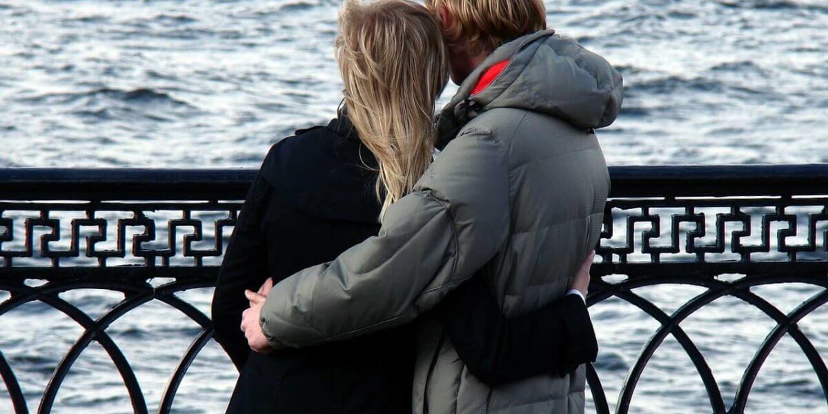 couple by water