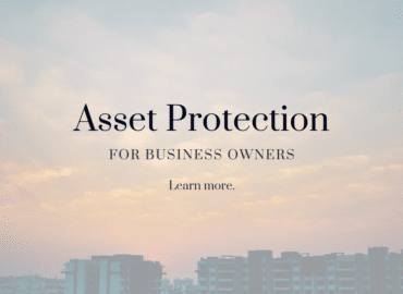 Promotional banner featuring the text "Asset Protection for Business Entities" over a calming sunset backdrop with silhouettes of city buildings. A button saying "Learn more" is also visible.
