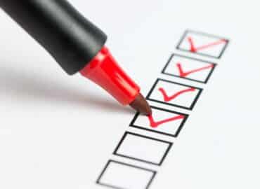 Checklist marked red with a red pen