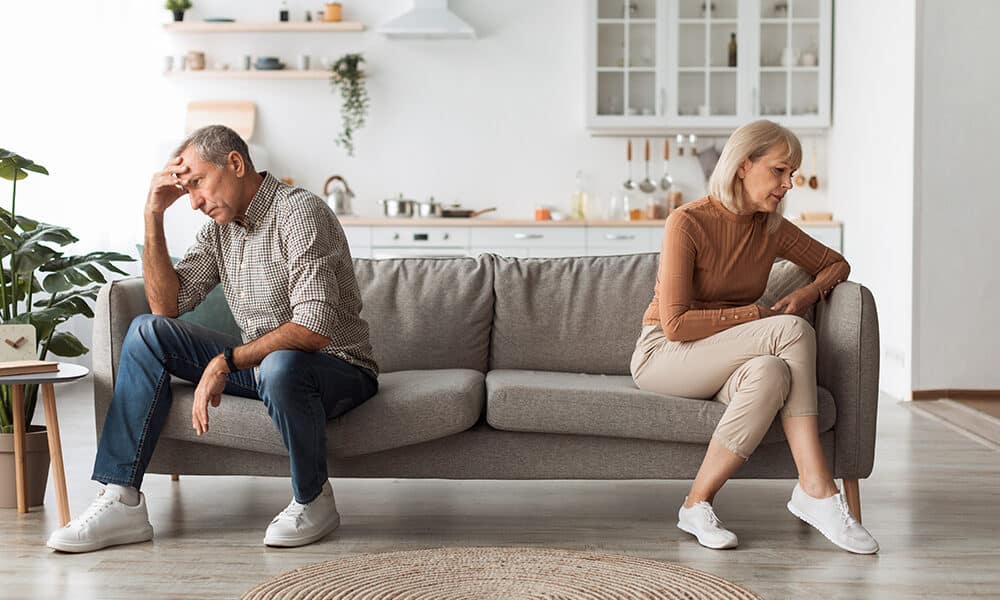 Unhappy Senior Couple Not Speaking After Quarrel Thinking About Divroce Sitting Back-To-Back, Experiencing Marital Crisis In Relationship At Home. Spouses Having Comunication Issues