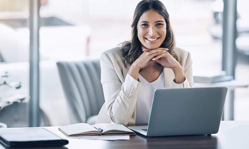 Attorney, portrait and laptop in office consulting, legal planning or policy review feedback in cor.