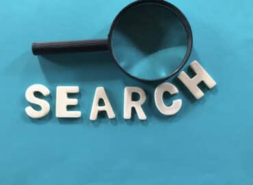 search word with magnifying glass