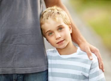 Daddys boy. A cute little boy with his father